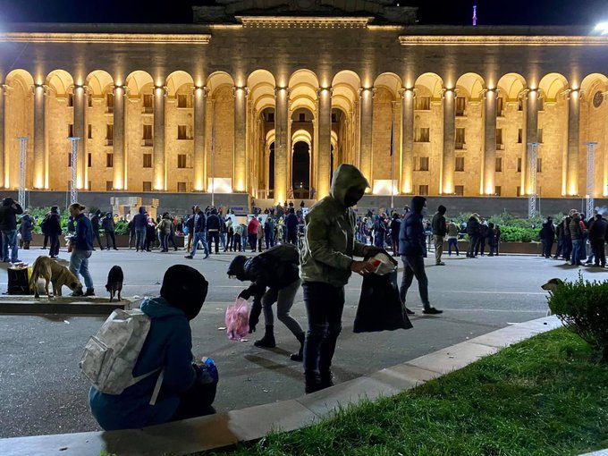 Protest in Tbilisi, still hasn't ended. People started cleaning the area in front of the parliament. 20 minutes until unconstitutional *Curfew* finishes. but people are going to wait until 6:00 so metro is opened and they can go in groups