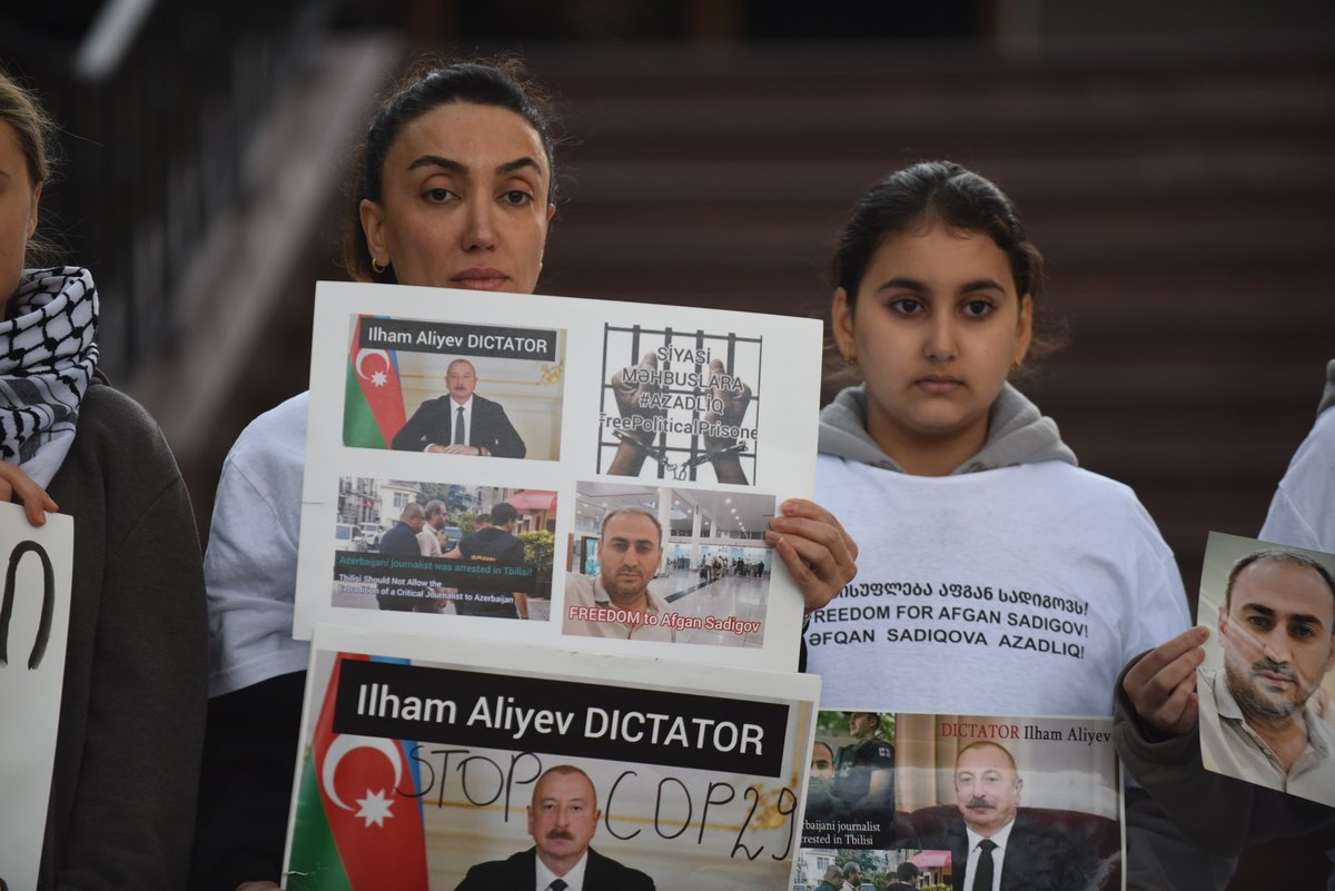 The family of detained Azerbaijani journalist Afghan Sadigov, who faces possible extradition to Azerbaijan, organised a small protest outside the Azerbaijani Embassy in Tbilisi to highlight the plight of 300  political prisoners in Azerbaijan as COP29 kicks off in Baku