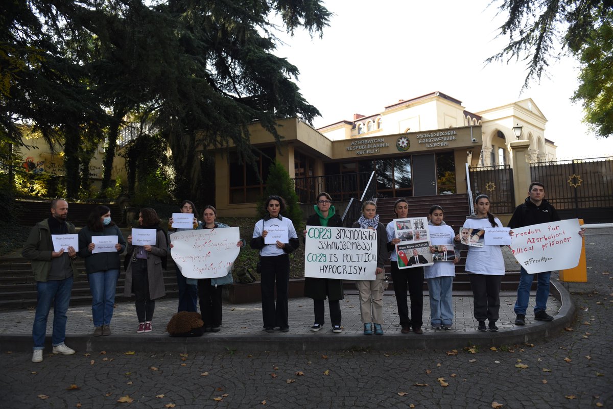 The family of detained Azerbaijani journalist Afghan Sadigov, who faces possible extradition to Azerbaijan, organised a small protest outside the Azerbaijani Embassy in Tbilisi to highlight the plight of 300  political prisoners in Azerbaijan as COP29 kicks off in Baku