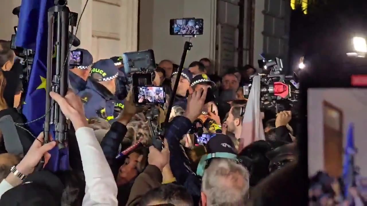 Protesters in Tbilisi have joined a group of students attempting to enter Tbilisi State University to conduct a sit-in against the falsification of October’s parliamentary elections. The situation remains tense as protesters and police confront each other