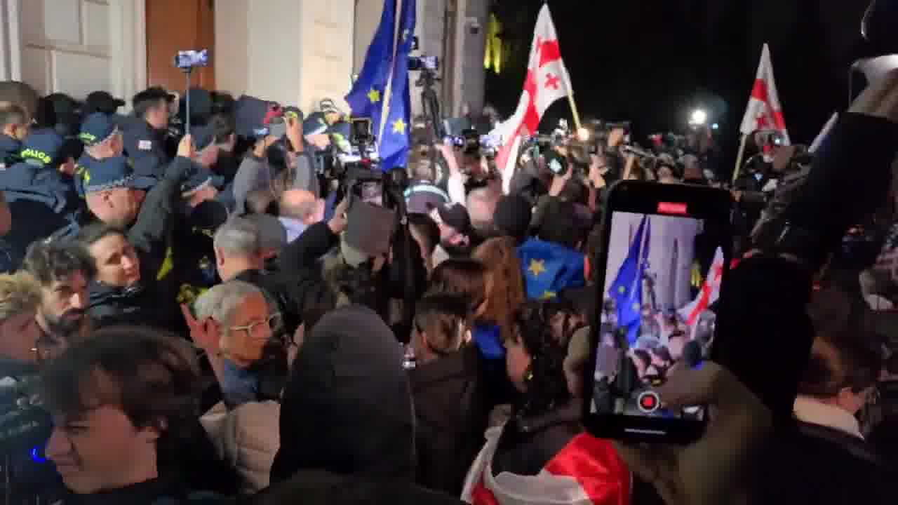 Protesters in Tbilisi have joined a group of students attempting to enter Tbilisi State University to conduct a sit-in against the falsification of October’s parliamentary elections. The situation remains tense as protesters and police confront each other