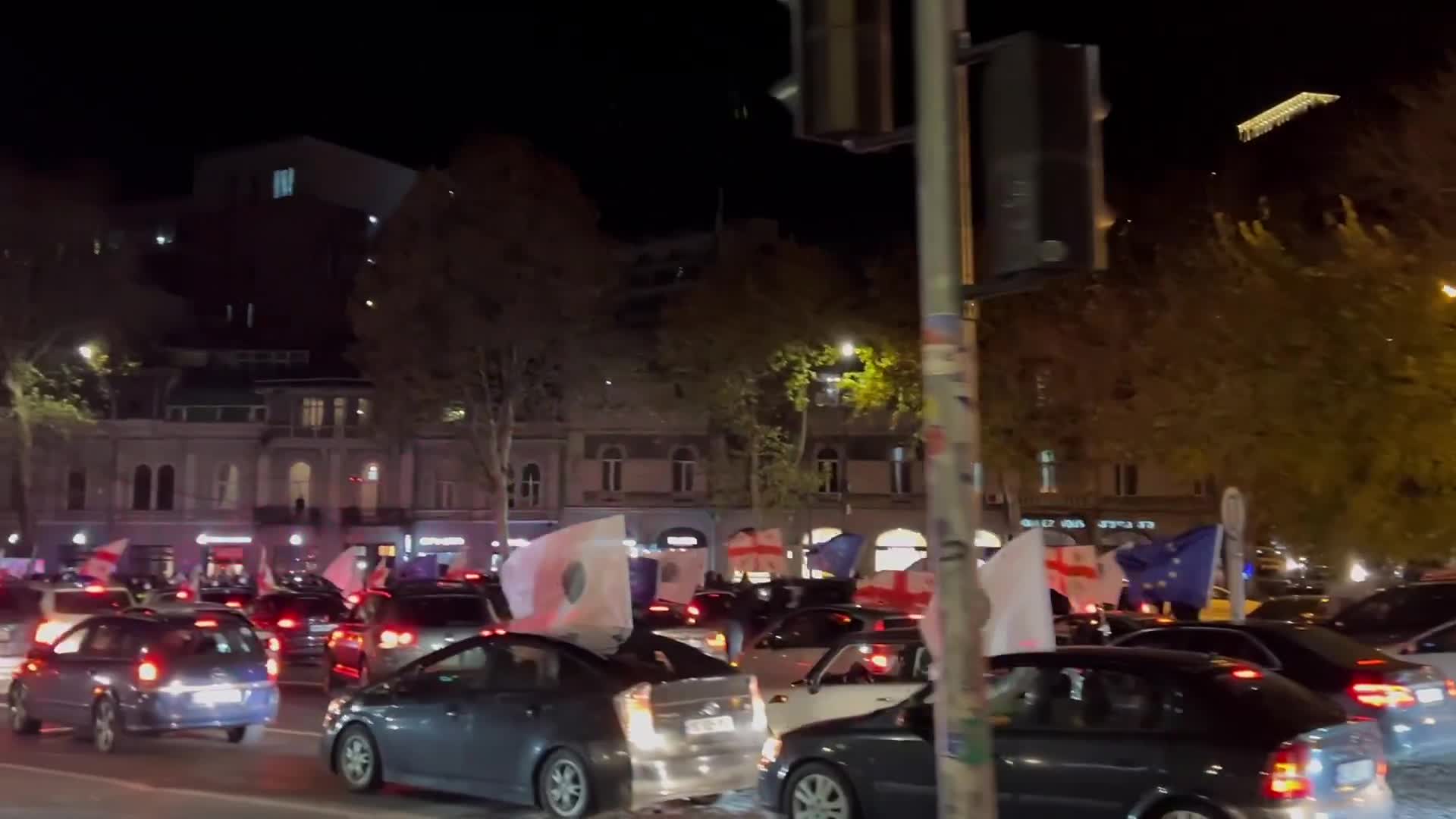 Protests ahead of the first parliamentary session have begun in Tbilisi, with people arriving from the regions and vehicles blocking the main avenue