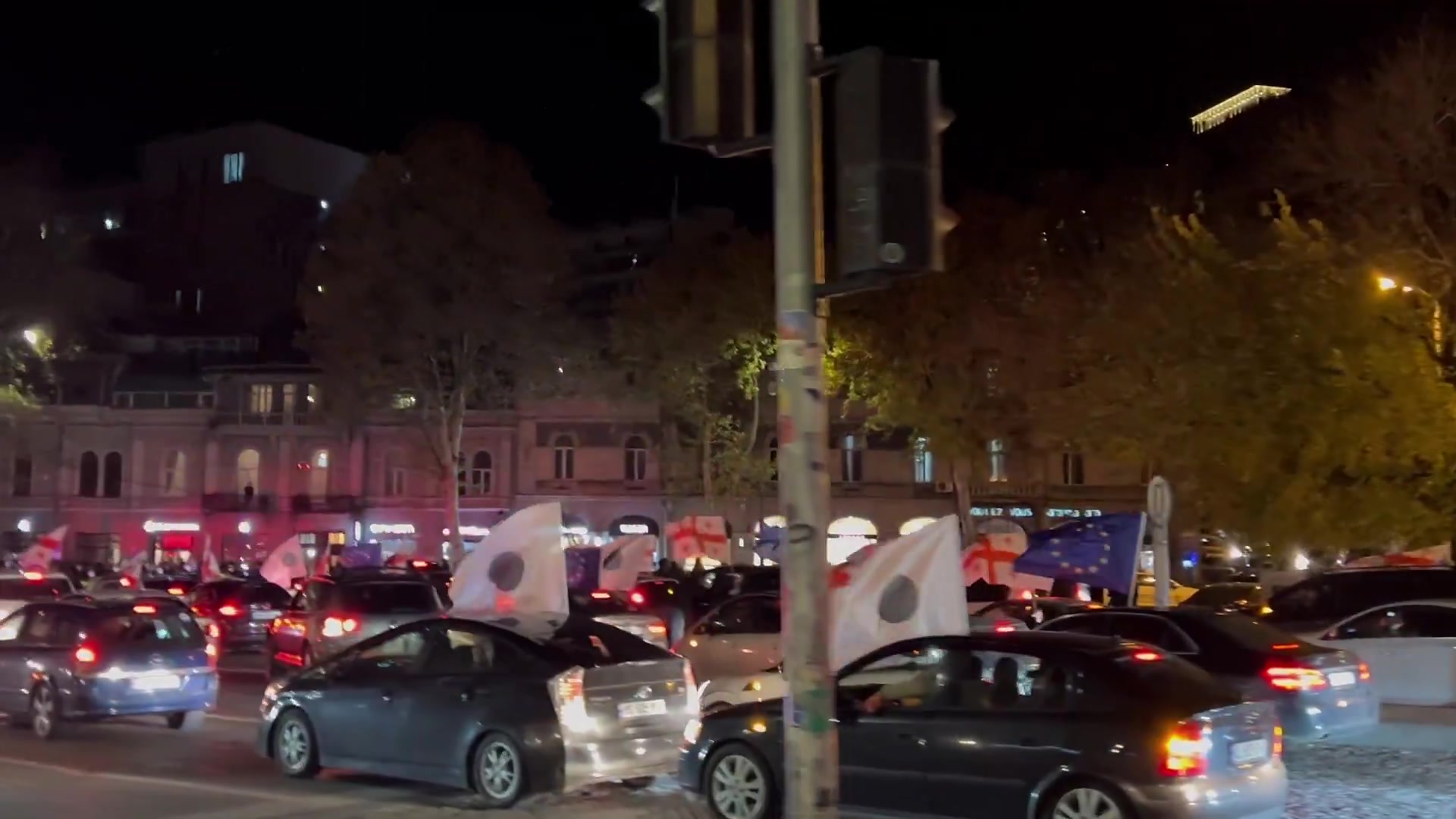 Protests ahead of the first parliamentary session have begun in Tbilisi, with people arriving from the regions and vehicles blocking the main avenue