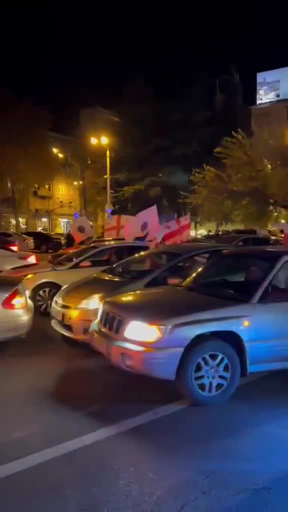 Citizens have gathered at Republic Square. Some plan to spend the night there and protest in front of Parliament tomorrow morning. It's currently around 22:10 in Tbilisi, and the police are preventing the protest convoy from moving from Republic Square to Rustaveli ave