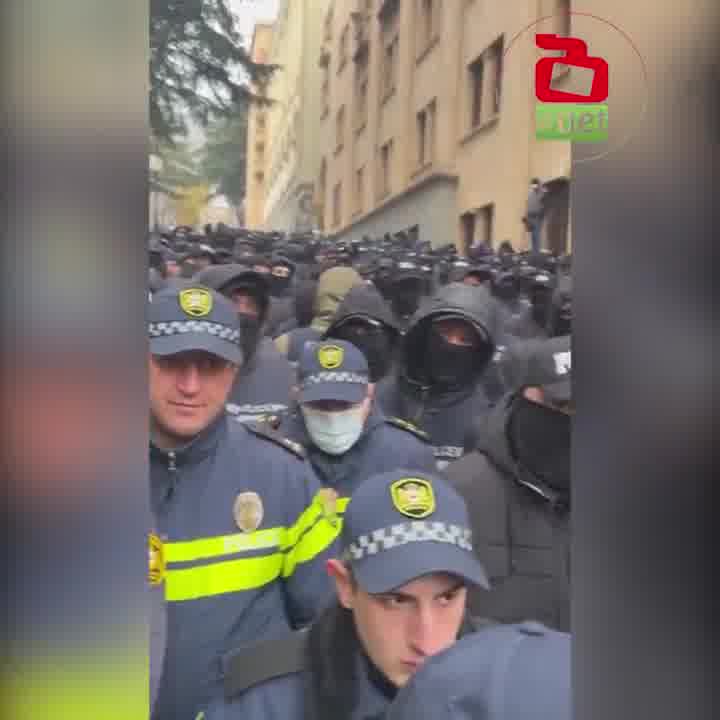 Chitadze Street, another adjacent to the Parliament, is blocked by heavy police, allowing Georgian Dream members to enter while avoiding protesters opposing the election results, which they deem illegitimate