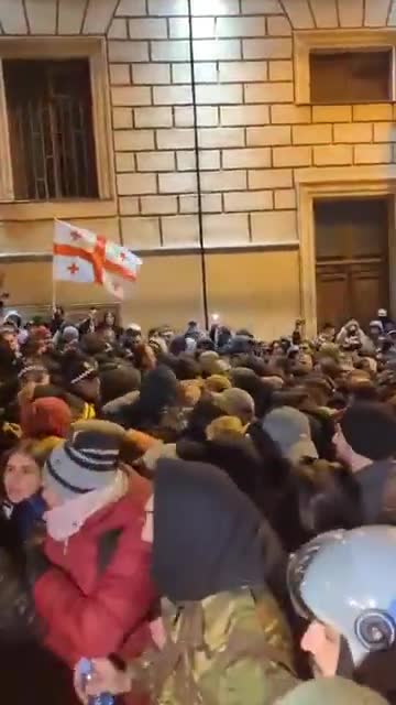 Things are getting tense on Chichinadze Street, by the parliament, as the standoff between protesters and police heats up, with both sides pushing against each other. Photo: Nini Gabritchidze/Civil.ge