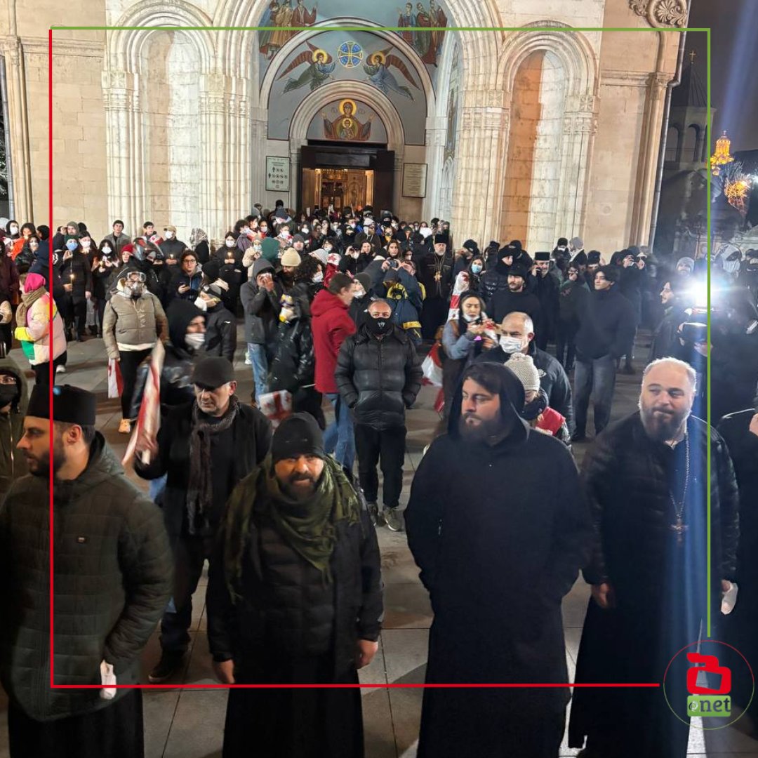 22:05 - Tbilisi As police began cracking down on the rally, some protesters gathered near Kashueti Church, with a clergyman standing before them