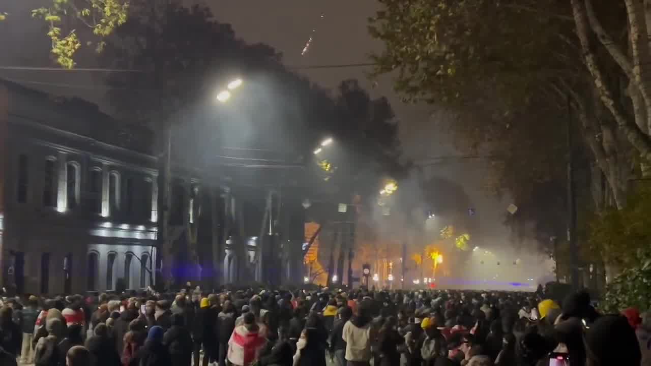 It’s midnight in Tbilisi. Riot police are stationed near the Marriott hotel, protesters are stretching across Rustaveli avenue. Tear gas is being deployed nonstop and is sensed throughout the entire area