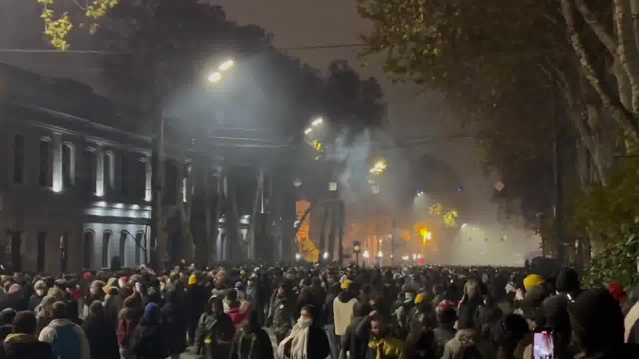 It’s midnight in Tbilisi. Riot police are stationed near the Marriott hotel, protesters are stretching across Rustaveli avenue. Tear gas is being deployed nonstop and is sensed throughout the entire area