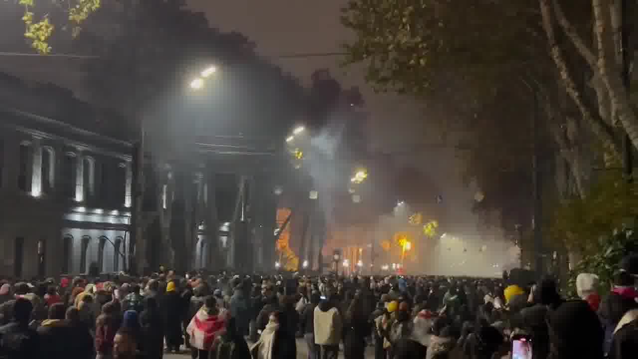 It’s midnight in Tbilisi. Riot police are stationed near the Marriott hotel, protesters are stretching across Rustaveli avenue. Tear gas is being deployed nonstop and is sensed throughout the entire area