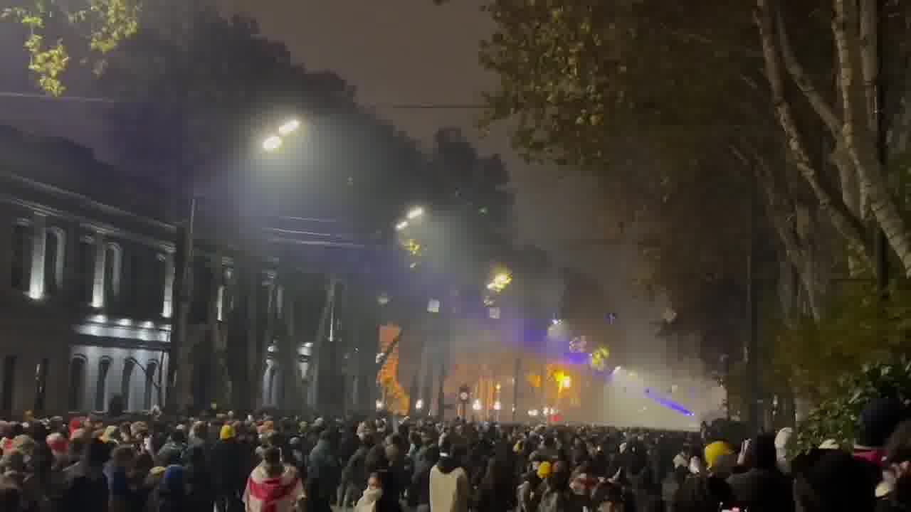 It’s midnight in Tbilisi. Riot police are stationed near the Marriott hotel, protesters are stretching across Rustaveli avenue. Tear gas is being deployed nonstop and is sensed throughout the entire area