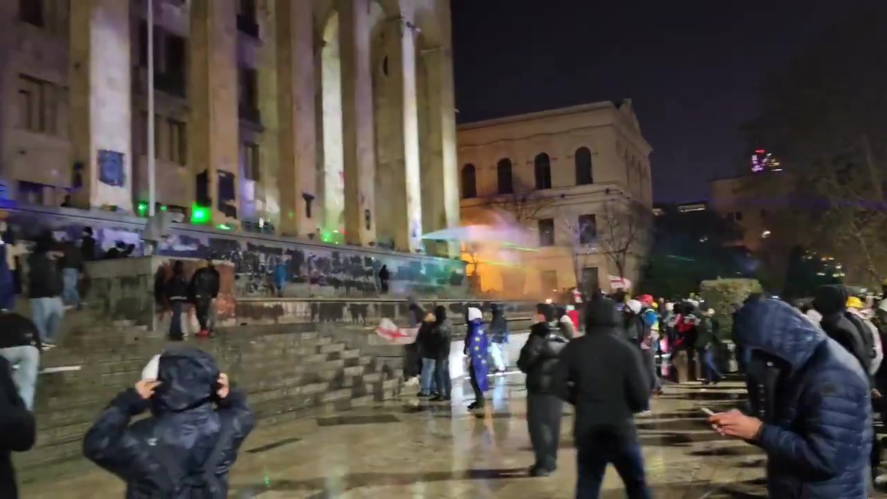 Police again started using water from firetrucks against protesters. Returning Abkhazia lies within Euro intergration ,banner says