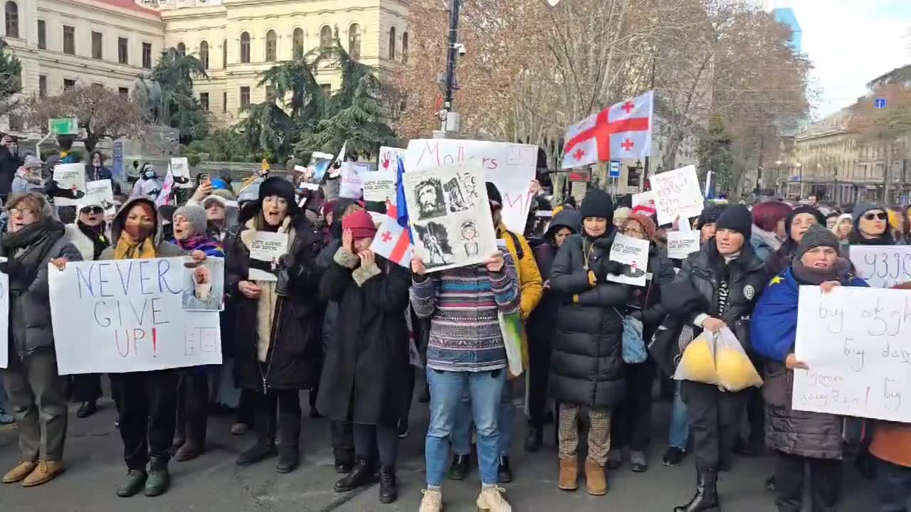 A group of mothers have marched to the Georgian Parliament to protest the presidential elections and violence against demonstrators before continuing on to Orbeliani Palace