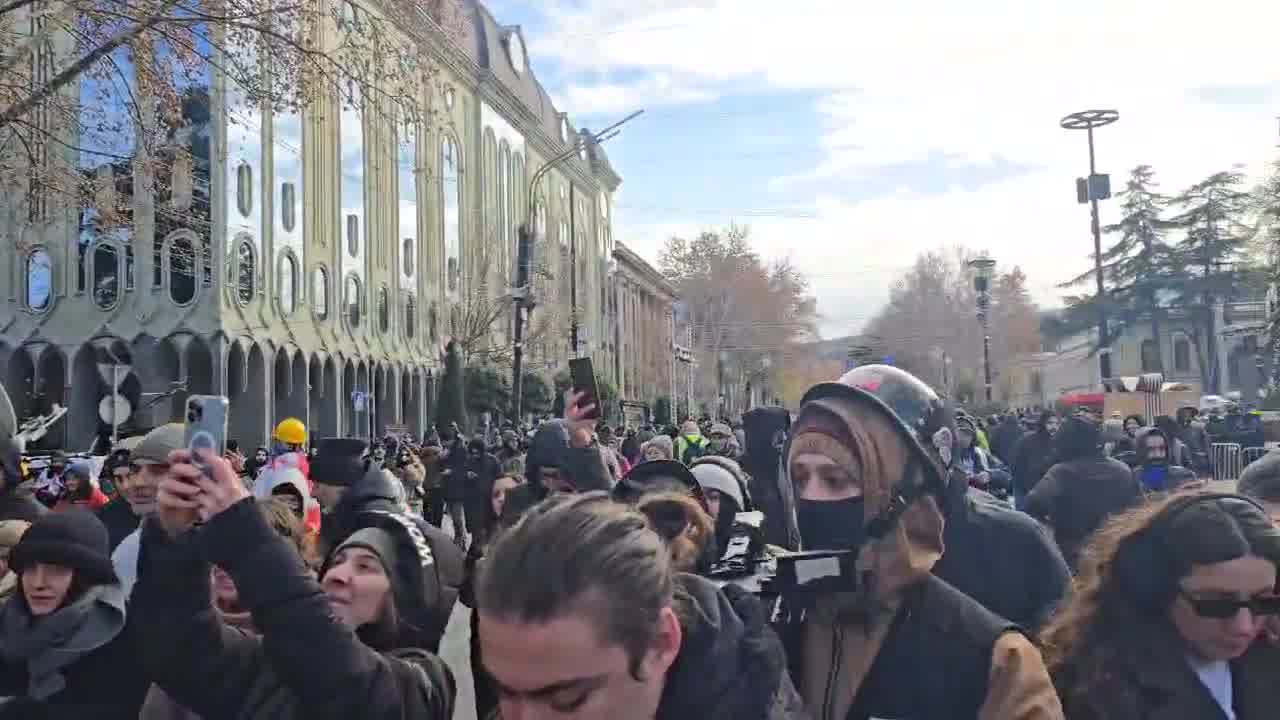 A group of mothers have marched to the Georgian Parliament to protest the presidential elections and violence against demonstrators before continuing on to Orbeliani Palace