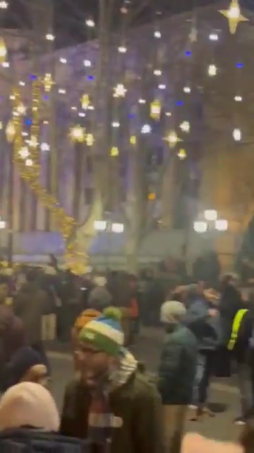 Protesters gather on Tbilisi's Rustaveli Avenue for Day 37 of Georgia Protests. Rallies continue amid Orthodox Christmas holidays, usually a passive week in Georgia. Day-offs have been announced for public institutions until January 10. Muro Takalandze