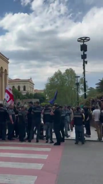 Rustaveli Avenue now, near the parliament building, where police arrested several demonstrators in a rally that was blocking the street. The unusual daytime gathering followed the earlier arrest of two other protesters last night on Easter