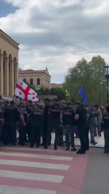 Rustaveli Avenue now, near the parliament building, where police arrested several demonstrators in a rally that was blocking the street. The unusual daytime gathering followed the earlier arrest of two other protesters last night on Easter