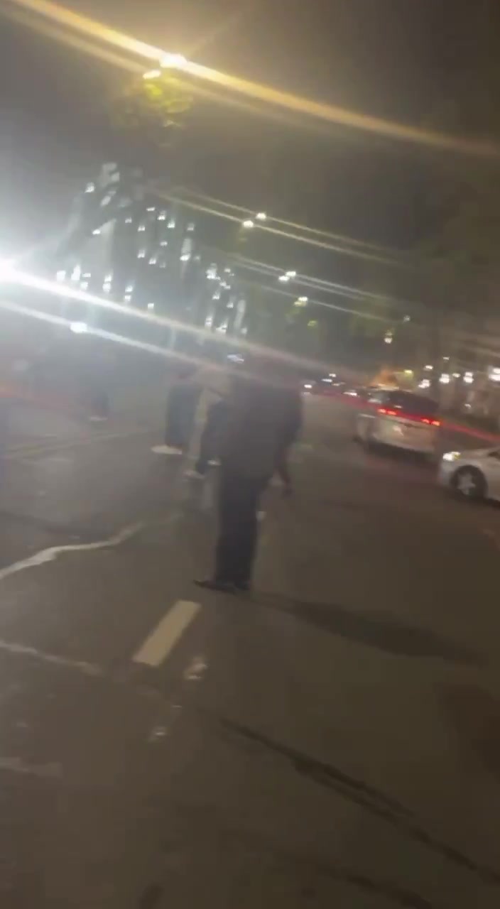 Police tries to reopen the closed Rustaveli Avenue. Earlier, bottles were thrown at protesters from a passing truck