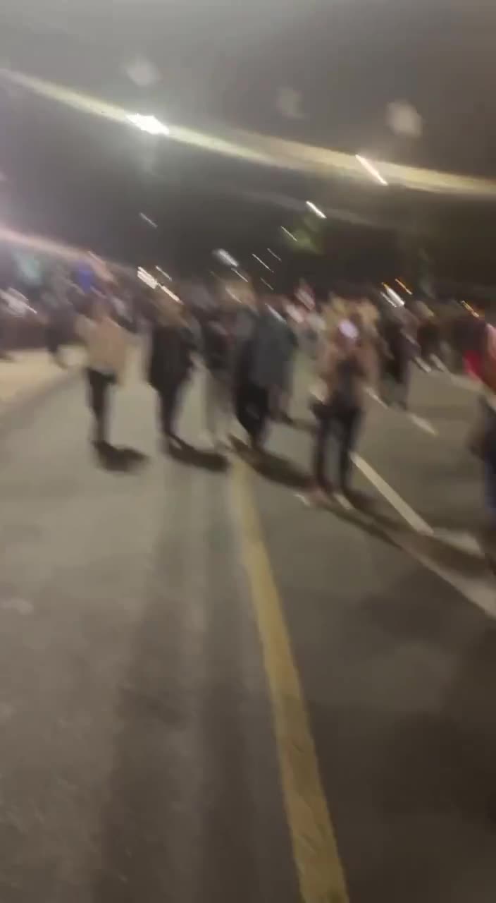 Police tries to reopen the closed Rustaveli Avenue. Earlier, bottles were thrown at protesters from a passing truck