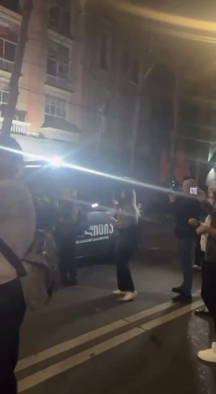 Police tries to reopen the closed Rustaveli Avenue. Earlier, bottles were thrown at protesters from a passing truck