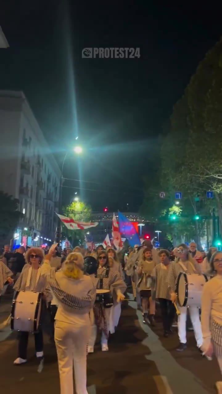 “Georgia cannot be captured.”Protesters march towards Rustaveli Avenue, blocked for the 319th consecutive day